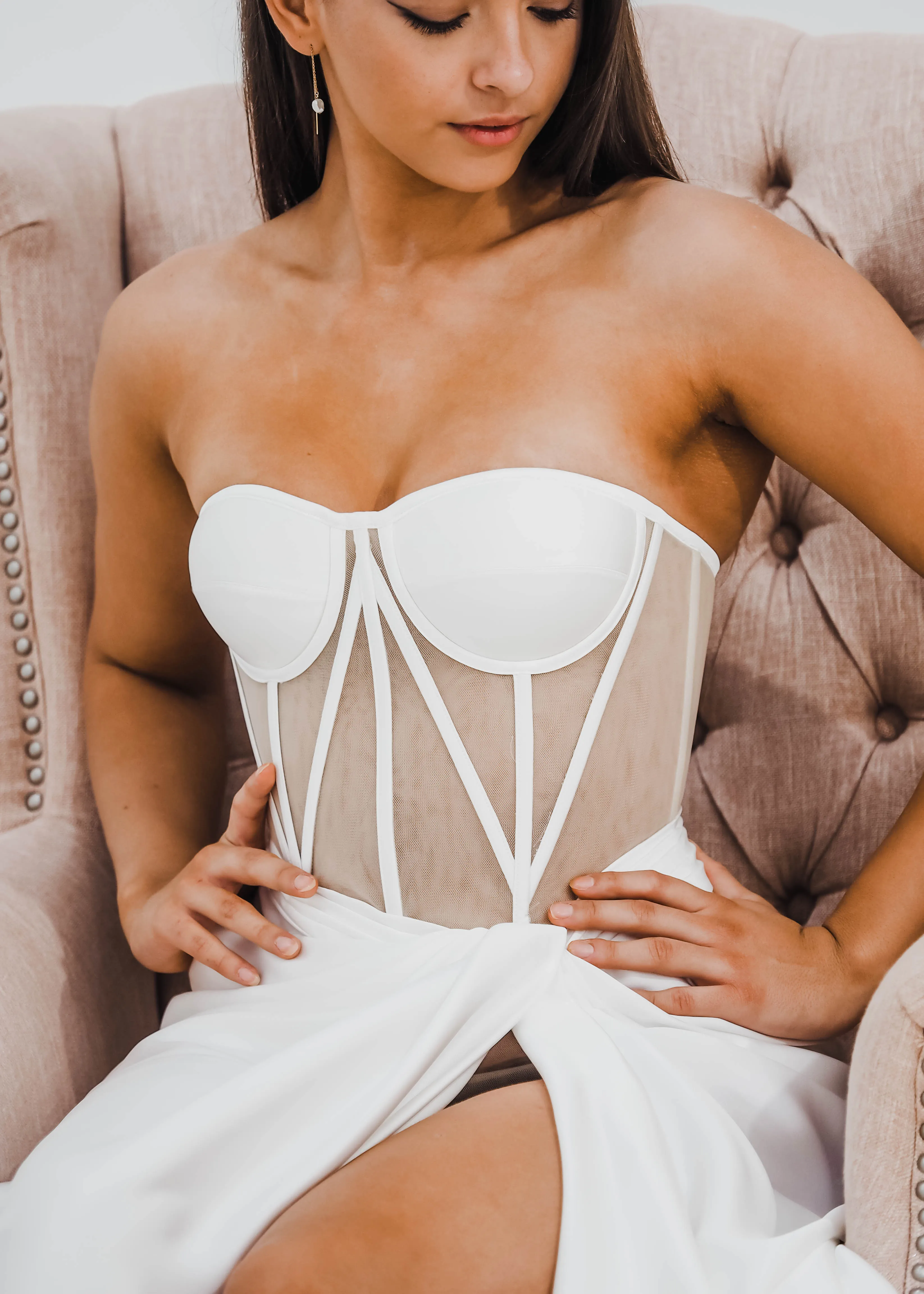 White bustier top with transparent bodice and high slit dress